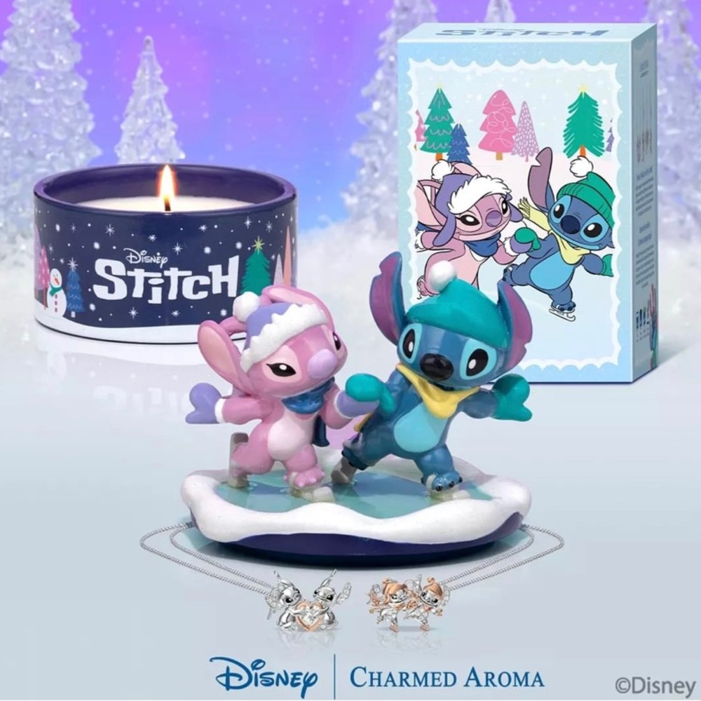 NEW AND ** SOLD OUT**   STITCH & ANGEL HOLIDAY CANDLE NWT